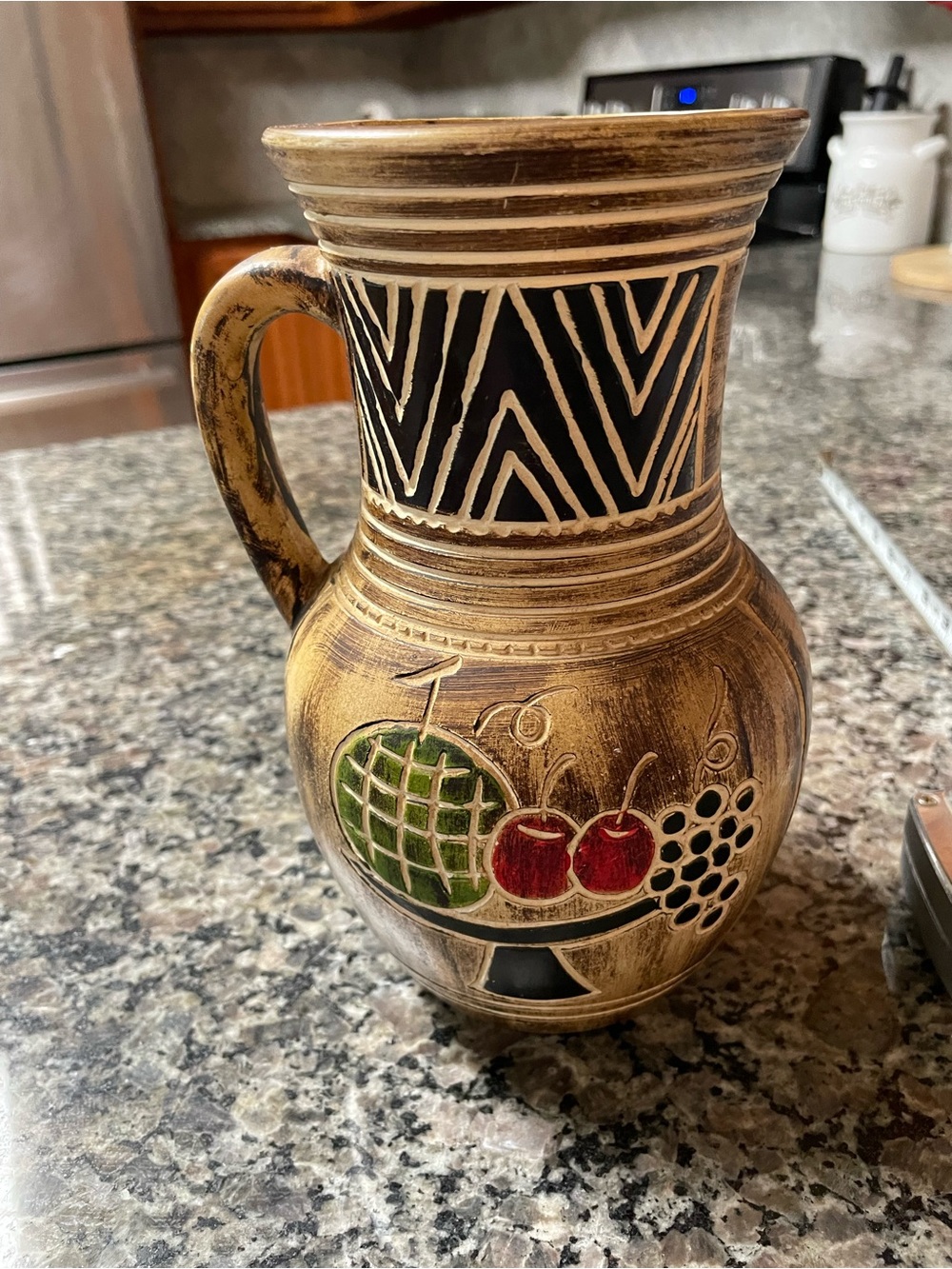 Handcrafted Brown Ceramic Pitcher Vase with Fruit Motif